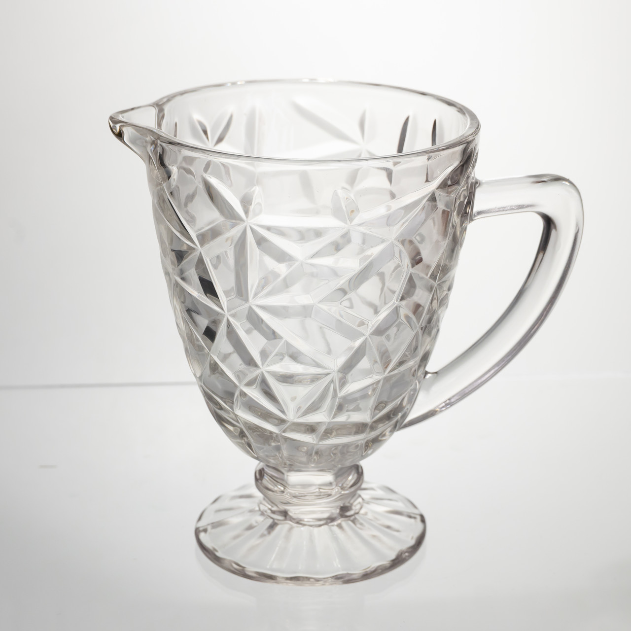 kuvshin_steklyannyy_dlya_kompota_1_2_l_prozrachnyy_rebristyy_figurnyy_grafin_dlya_limonada_mohito_sangrii_napitkov Глек скляний для компоту 1.2 л прозорий ребристий фігурний графин для лимонаду HP-19-163 - Зображення 1