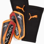 Щитки Puma ULTRA Flex Sleeve чорний, помаранчевий S (зріст 115-135 см) (030987-05)