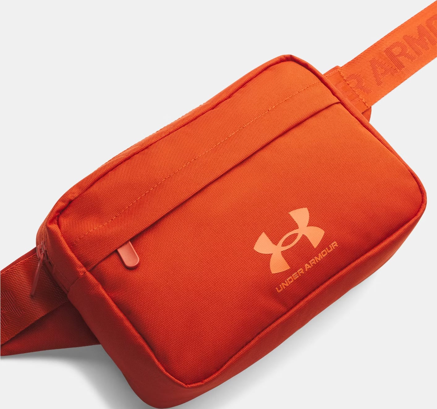 98570221324157_e61c7137d2 Сумка на пояс Under Armour Essential Lite WB Xbody 2L помаранчевий 15,3 x 24 x 10,5 см (1381914-842) - Зображення 1